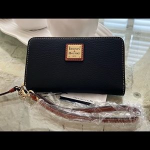 NWT / Navy Dooney and Bourke wallet with wrist strap